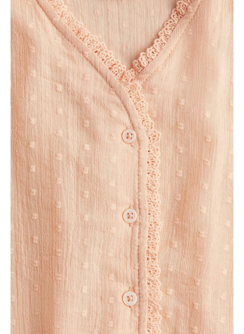 H&M Lace-trimmed cotton blouse