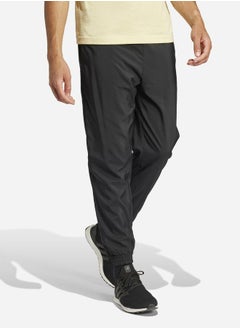 Essentials Stanford Cuffed Hem Printed Logo Pants - pzsku/ZF02DD257C8E8E4B720A2Z/45/_/1739732118/6b7dd9ff-dd41-48e8-82d4-8f08d606a60e