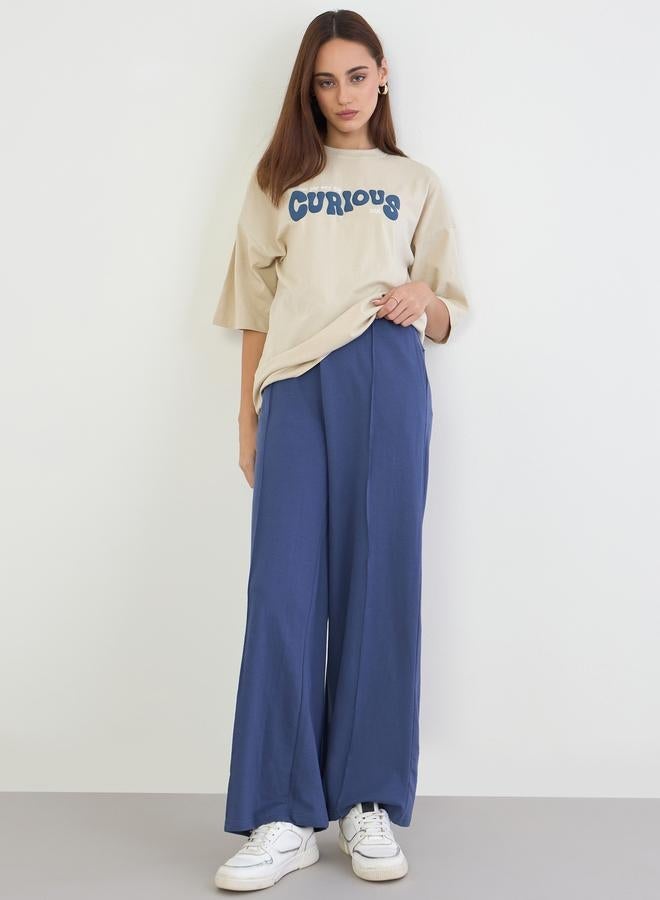 ستايلي تيشيرت واسع بطبعة كتابة - Image 2