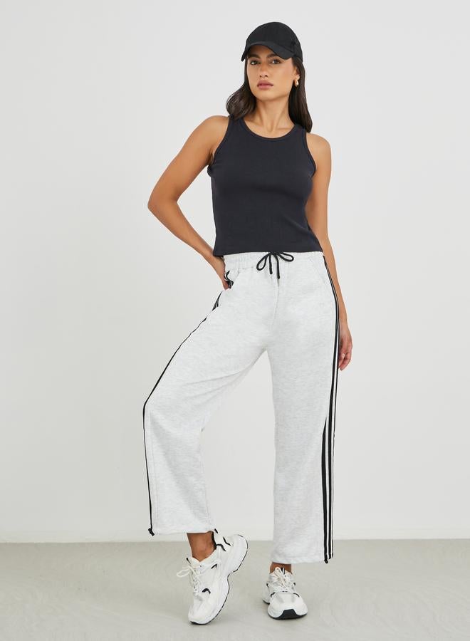 ستايلي بنطلون جوجر بقصة واسعة وخطوط جانبية مع رباط - Image 1