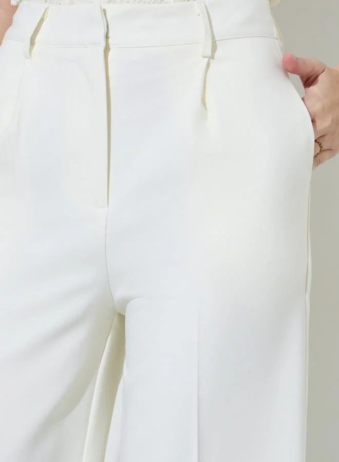 Styli  Off White Solid Tailored Wide-Leg Trousers for Women | Best Price UAE