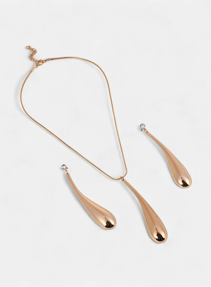SOHI SOHI Women The Elongated Drip Jewellery Set | Pale  Colour | One-Size | Metallic Alloy Material | Lobster Clasp & Push Back Closure | Pendant Necklace & Drop Earrings For Casual & Evening Wear