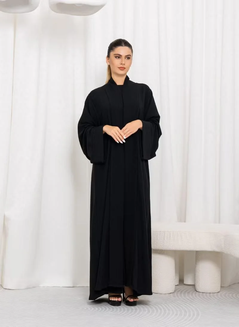 نيكياس نيكياس قماش أسود مع شريط أمامي مطوي