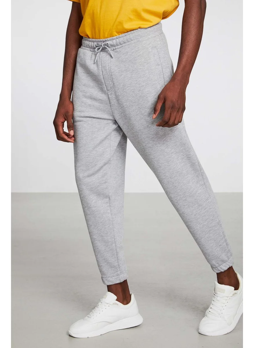 جريميلانج Irregular Men's Regular Fit Elastic Leg Diagonal Fabric Sweatpants