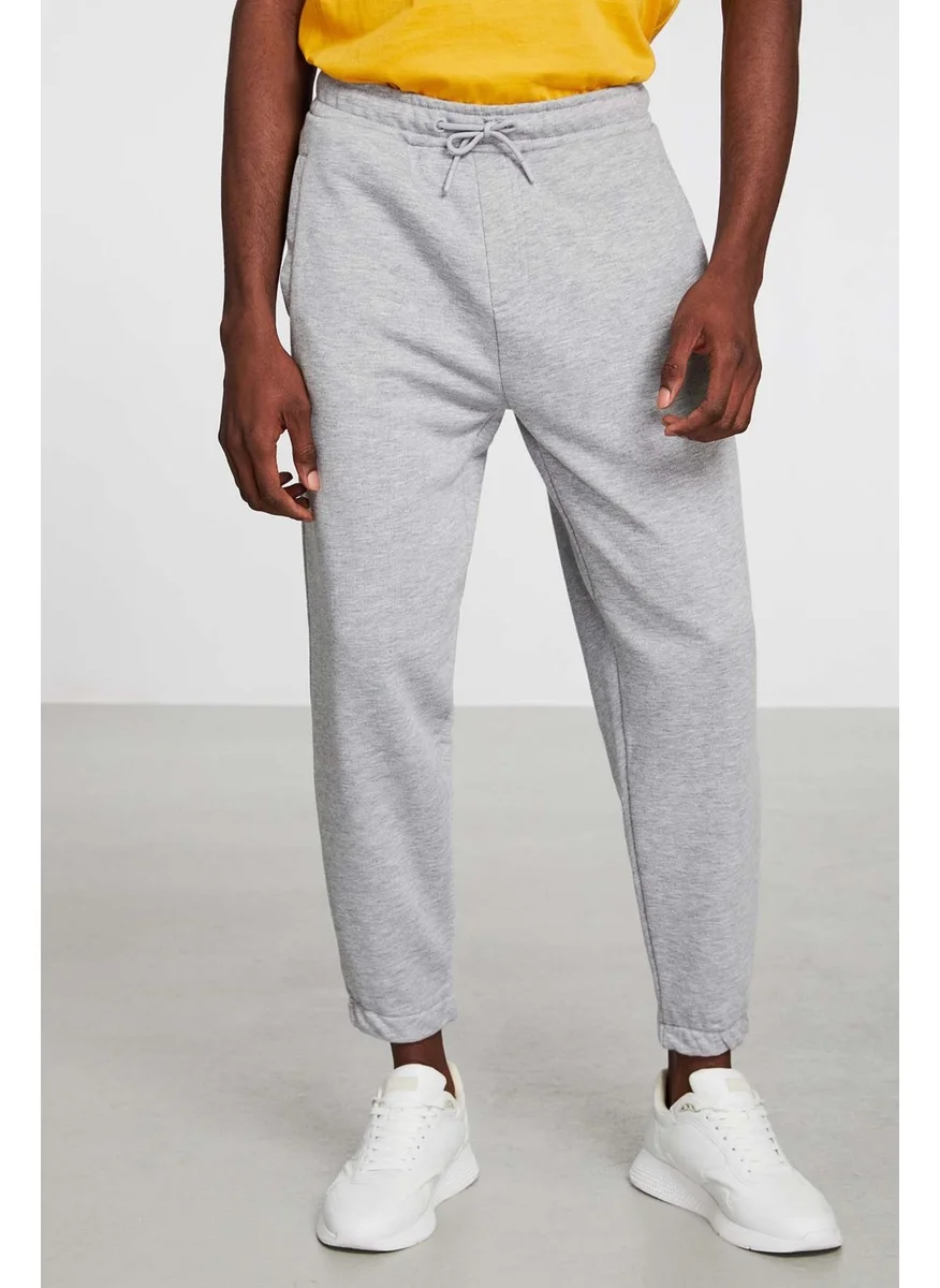 جريميلانج Irregular Men's Regular Fit Elastic Leg Diagonal Fabric Sweatpants