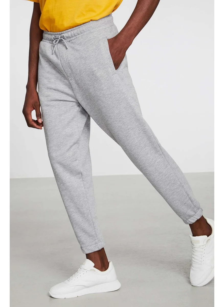جريميلانج Irregular Men's Regular Fit Elastic Leg Diagonal Fabric Sweatpants