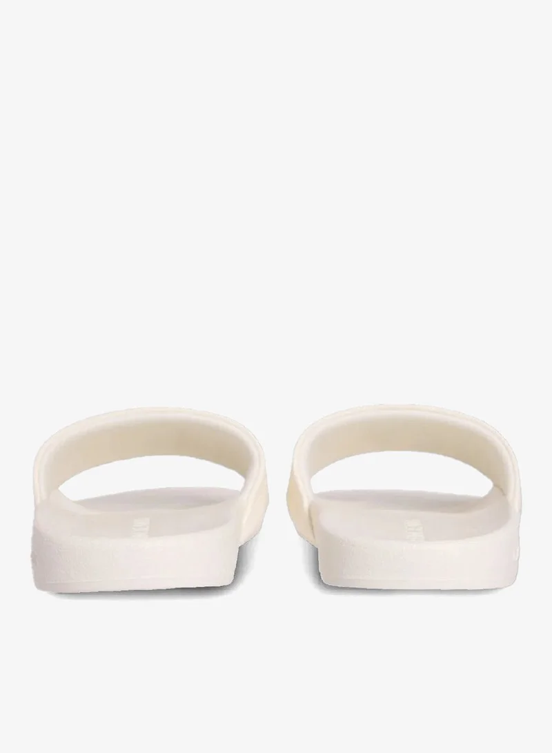 Calvin Klein Jeans Sweet Corn Logo Slides for Women | Best Price UAE