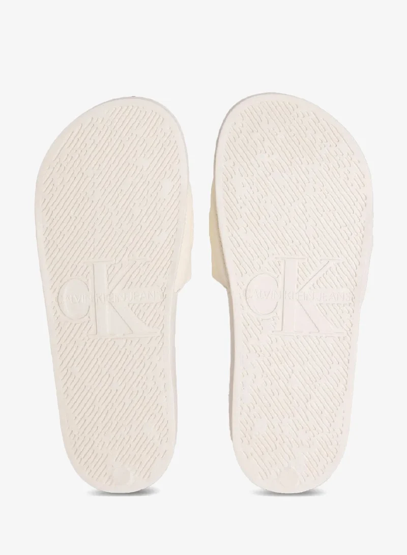 Calvin Klein Jeans Sweet Corn Logo Slides for Women | Best Price UAE