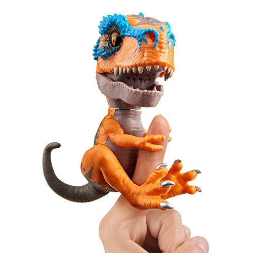 WowWee Untamed TRex by Fingerlings Scratch Orange Interactive Collectible Dinosaur By WowWee - Image 1