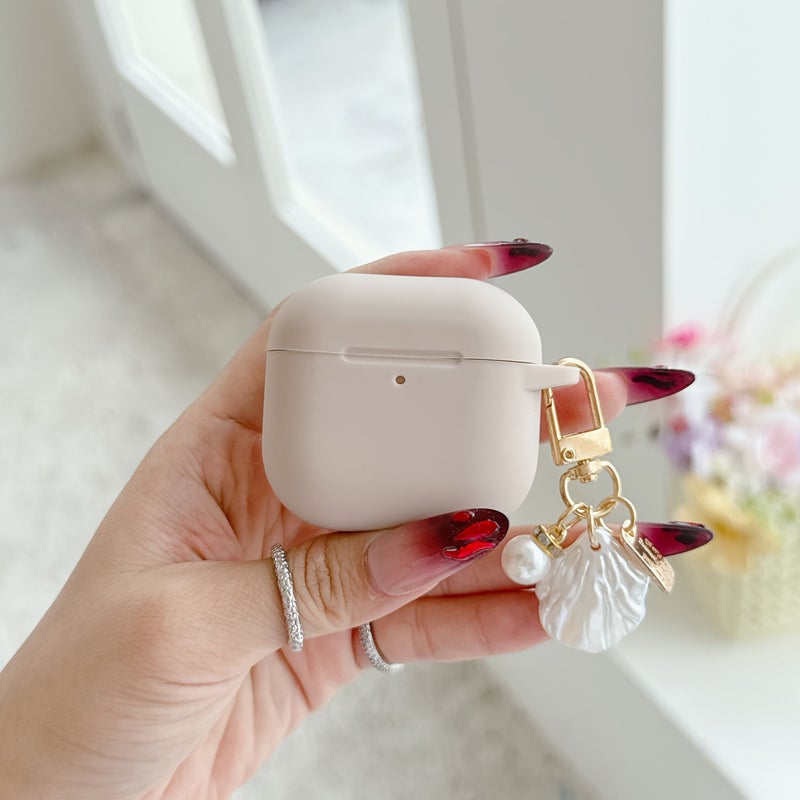 حافظة وردية مقاومة للسقوط مع زخارف صدفية لؤلؤية مخصصة لـ AirPods 4 - Image 1