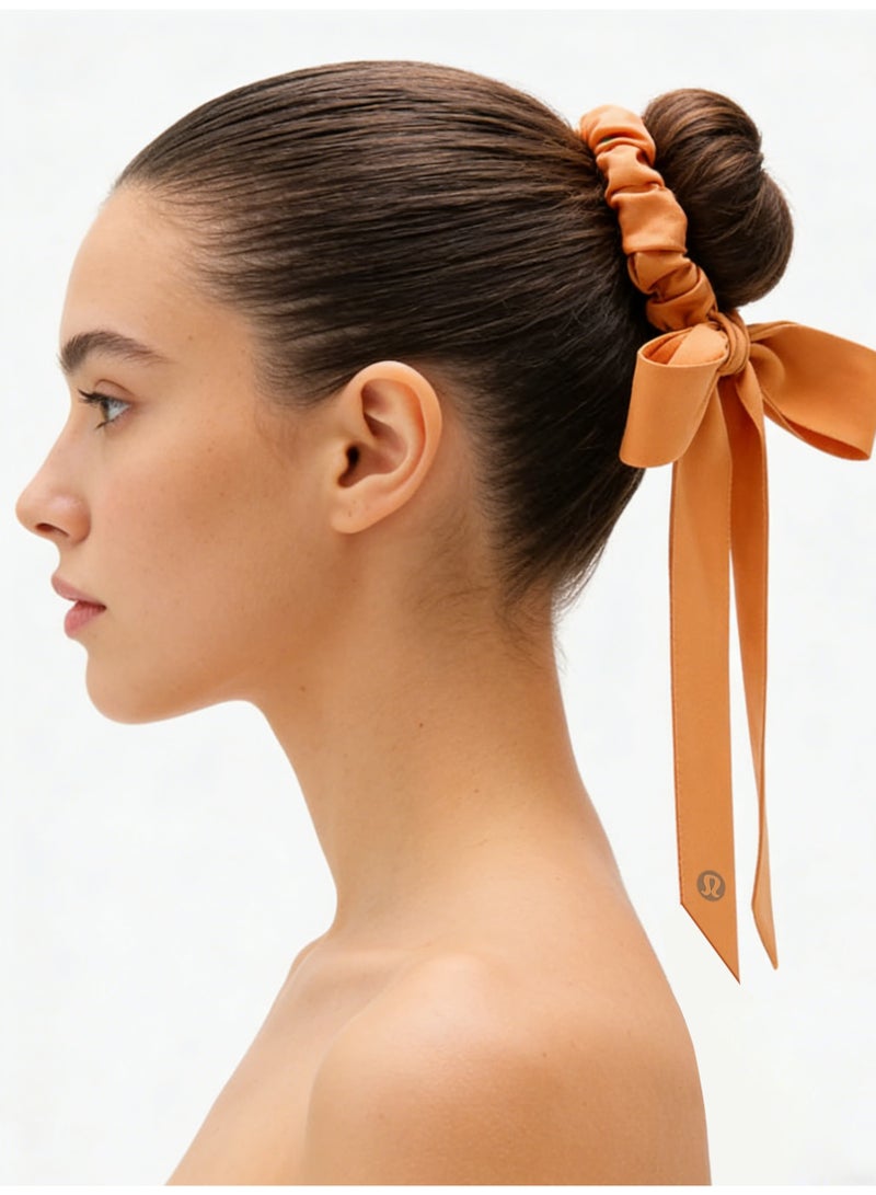 لولوليمون Lululemon satin tight headband with bow tie - a signature hair accessory for yoga, gym, and daily styling - Image 4