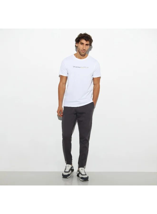 Iconic Iconic Typographic Print T-shirt with Crew Neck and Short Sleeves