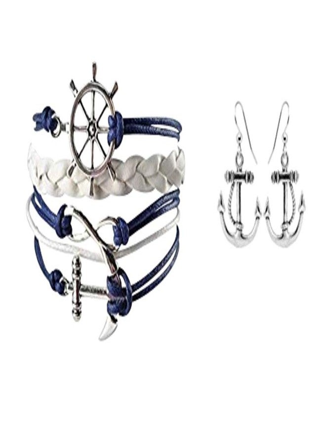 إنفينيتي كوليكشن أقراط وسوار بتصميم مرساة بحرية من مجموعة إنفينيتي للنساء، سوار مضفر باللونين الكحلي والأبيض، حبل جلدي منسوج مزين بعجلة قيادة سفينة ودلايات مرساة - Image 1