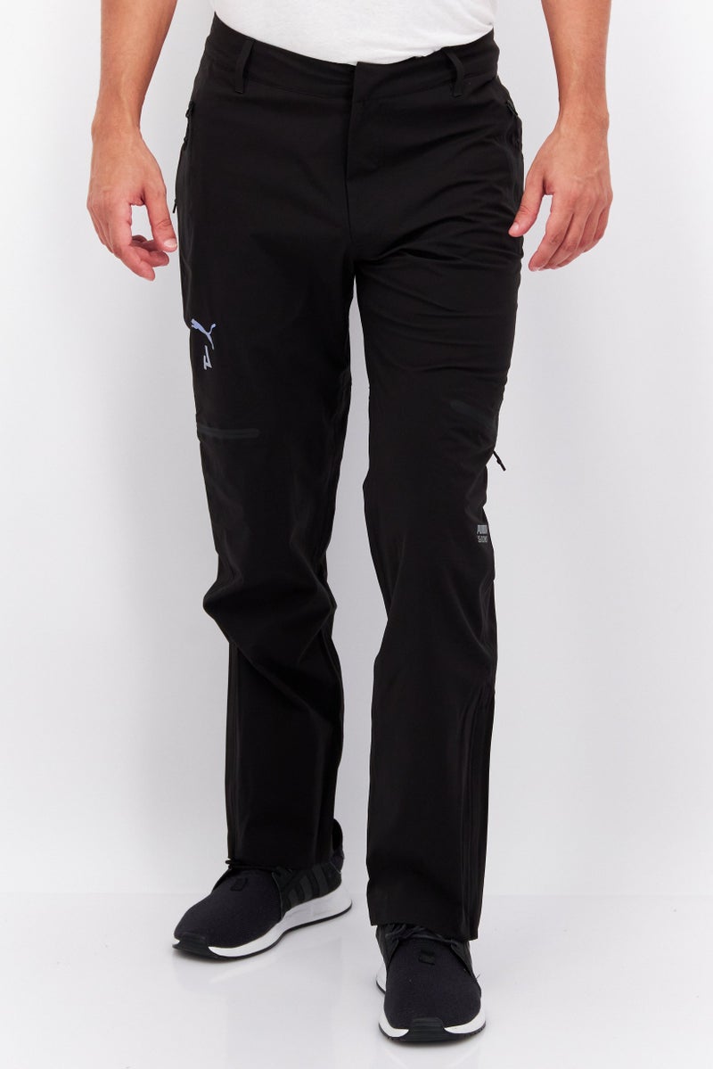 PUMA Men Sportswear Fit Outdoor Track Pants, Black  - Image 1