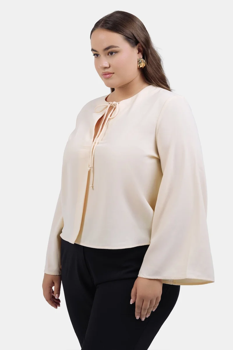 Virgio Cream Solid Crepe Flared Plus Size Top With Front Tie-Up Detail for Women for Women | Best Price UAE