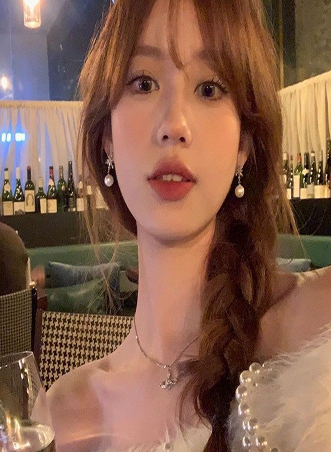 اتش تي اتش أقراط شجرة عيد الميلاد للنساء من HTH، مرصعة بأحجار الراين الملونة واللؤلؤ، مع جرس صغير وقوس وشكل ندفة ثلجية، هدية مثالية لحفلات عيد الميلاد (لؤلؤي، أخضر) - Image 4