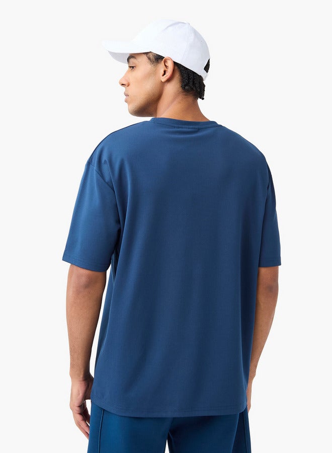 كابا تيشيرت بياقة ضيّقة وأكمام قصيرة وشعار من كابا - Image 3