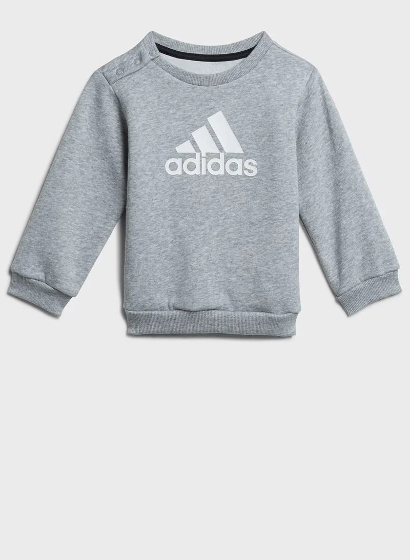 adidas بدلة رياضية بشعار الماركة