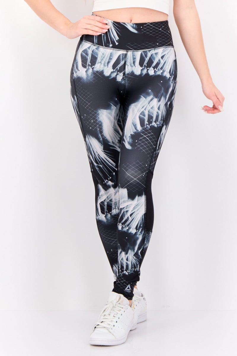 Reebok سراويل رياضية نسائية ملائمة 7/8 للجري، سوداء - Image 1