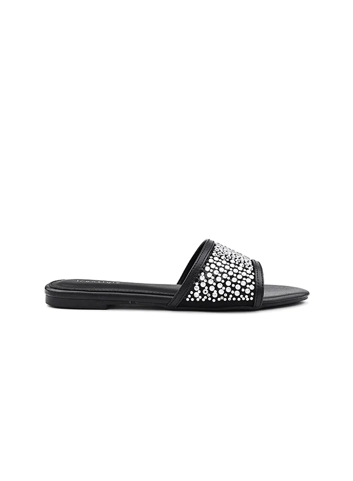 أيقون Festive flat sandal with a sparkling lace front.