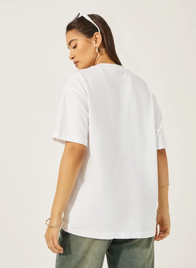 Styli Embroidered Oversized Round Neck Longline T-Shirt