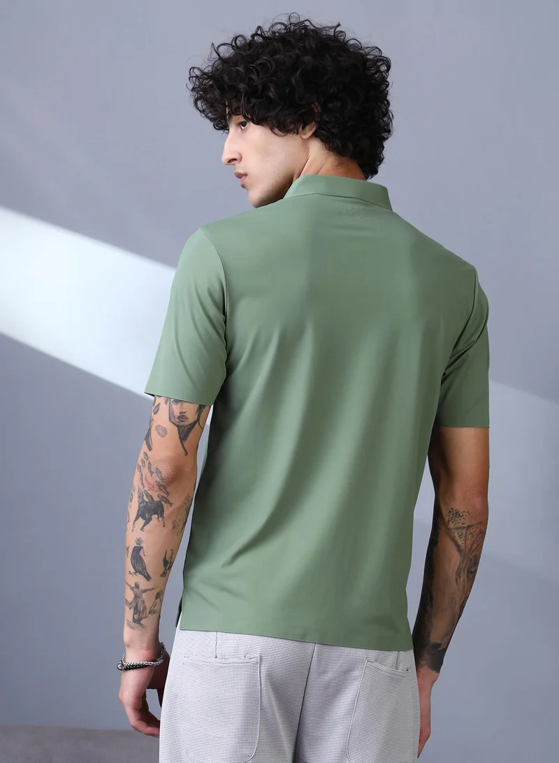 Campus Sutra Campus Sutra Men's Pistachio Green Seamless Touchgrain Polo T-Shirt For Casual Wear | Polo Neck | Short Regular Sleeves | Half-Button Closure | T-Shirt Crafted With Comfort Fit For Everyday Wear