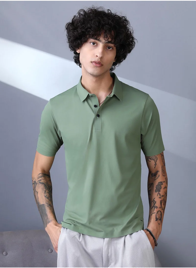 Campus Sutra Campus Sutra Men's Pistachio Green Seamless Touchgrain Polo T-Shirt For Casual Wear | Polo Neck | Short Regular Sleeves | Half-Button Closure | T-Shirt Crafted With Comfort Fit For Everyday Wear