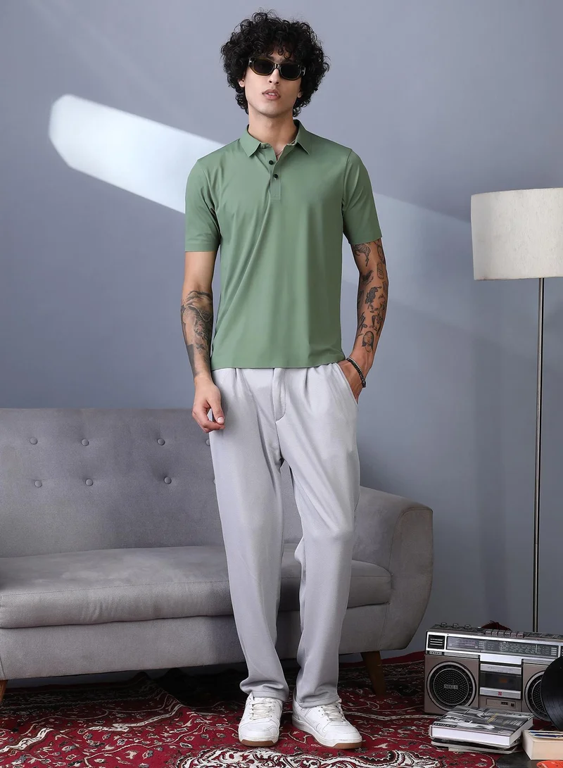 Campus Sutra Campus Sutra Men's Pistachio Green Seamless Touchgrain Polo T-Shirt For Casual Wear | Polo Neck | Short Regular Sleeves | Half-Button Closure | T-Shirt Crafted With Comfort Fit For Everyday Wear