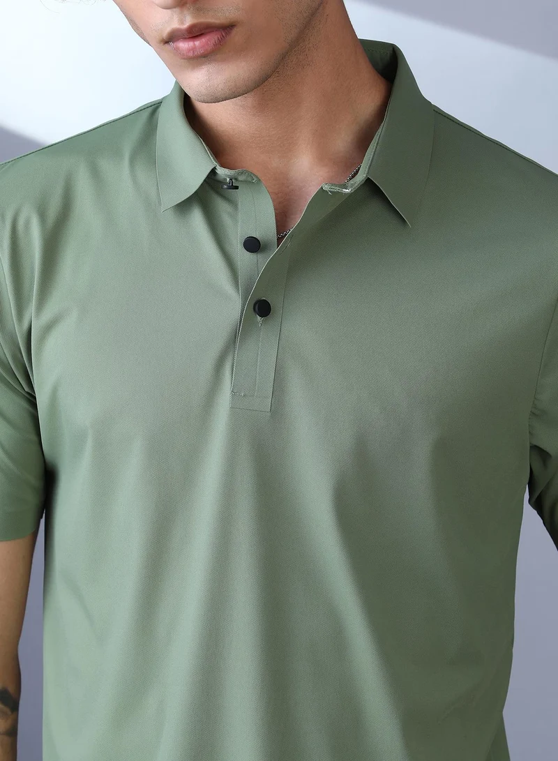 Campus Sutra Campus Sutra Men's Pistachio Green Seamless Touchgrain Polo T-Shirt For Casual Wear | Polo Neck | Short Regular Sleeves | Half-Button Closure | T-Shirt Crafted With Comfort Fit For Everyday Wear