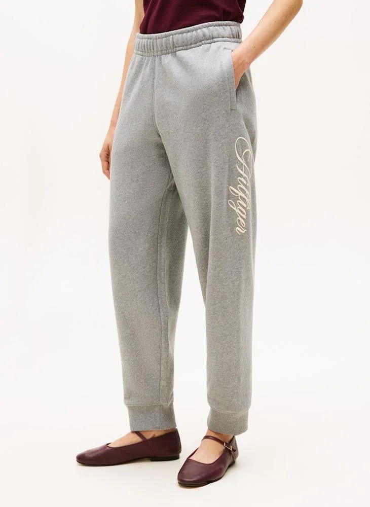 تومي هيلفيغر بنطلون رياضي بأساور مطبوعة