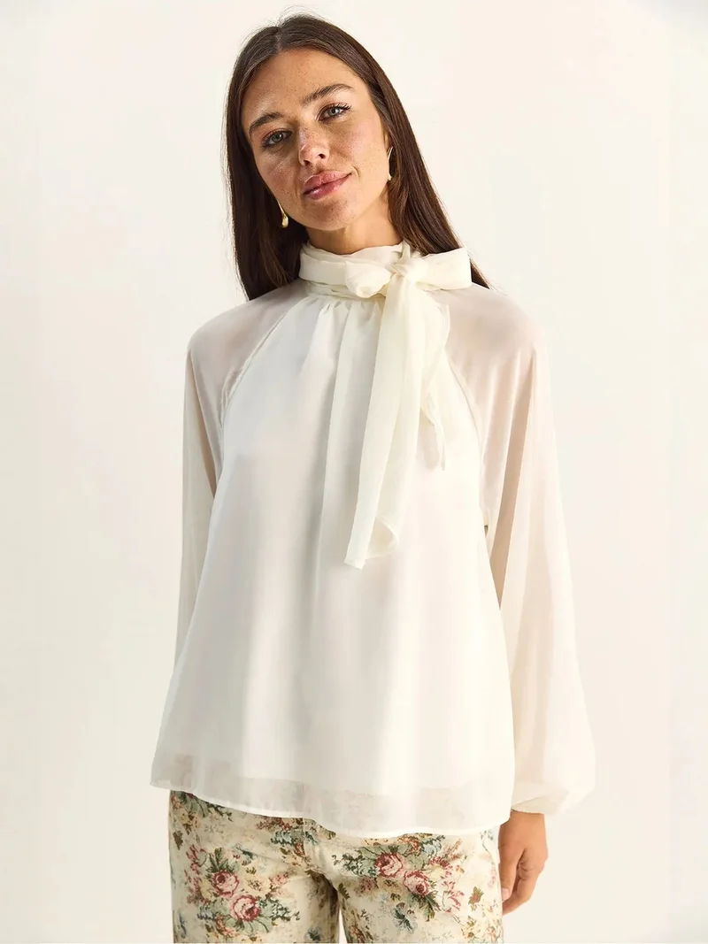 بيانكو لوتشي LUCCI Turtleneck Chiffon Blouse