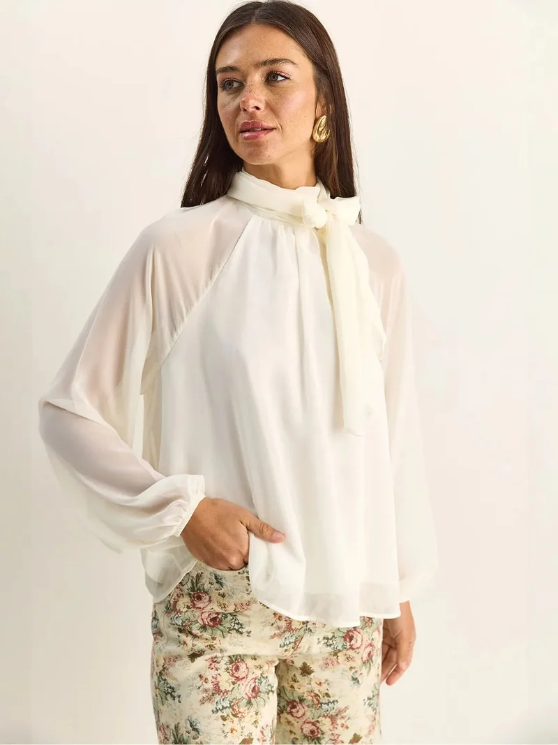 بيانكو لوتشي LUCCI Turtleneck Chiffon Blouse
