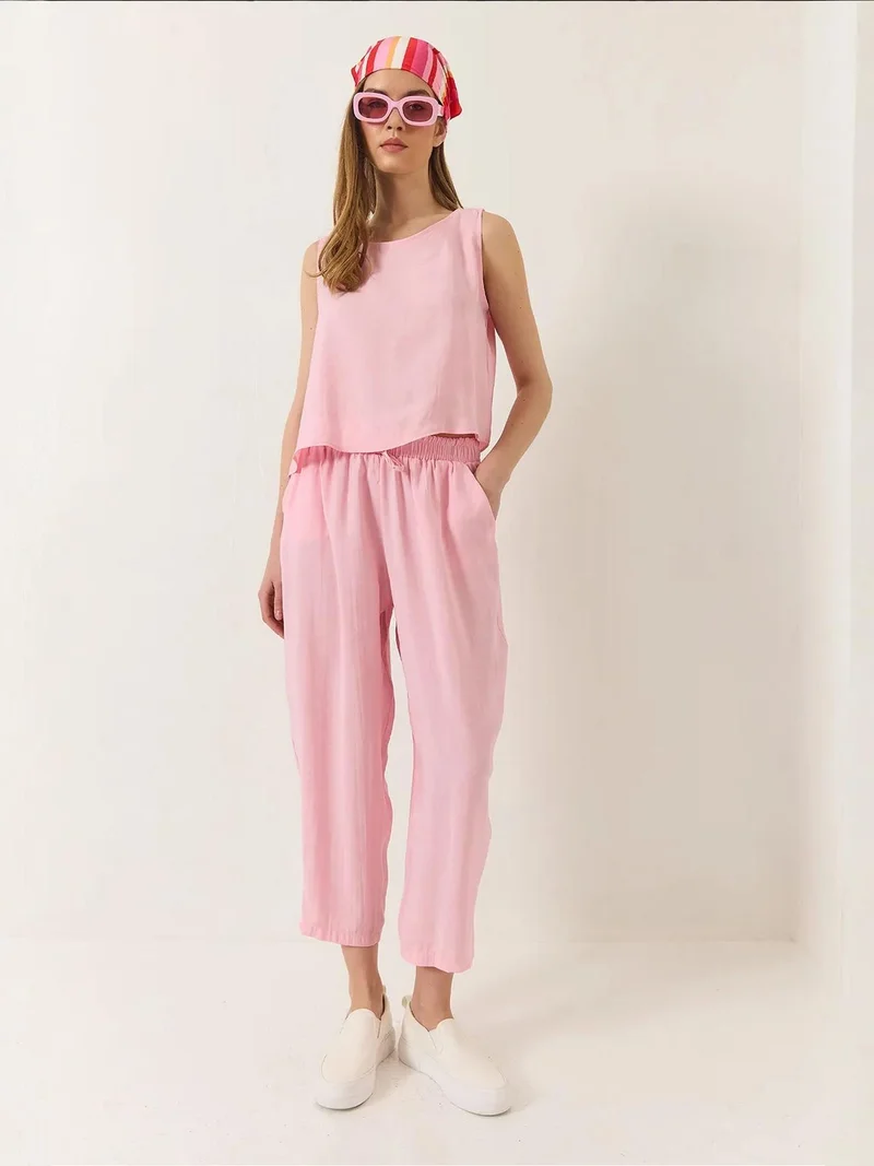 بيانكو لوتشي طقم تونيك بدون أكمام بياقة دائرية وبنطلون واسع الساق من لوتشي