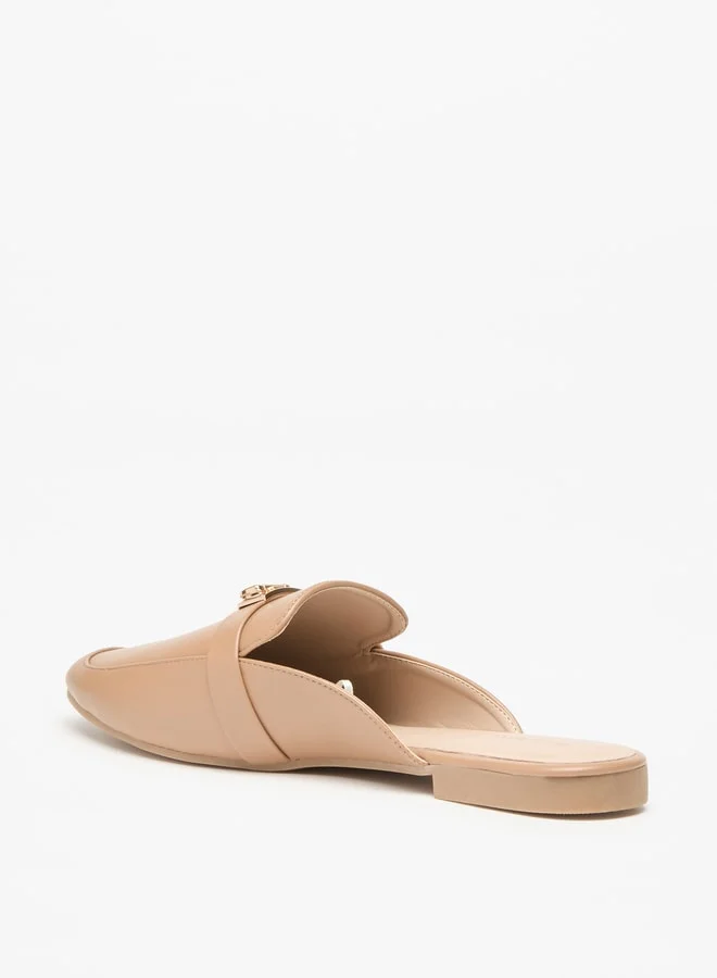 فلورا بيلا من شو إكسبرس Women's Solid Slip-On Mules with Metal Accent
