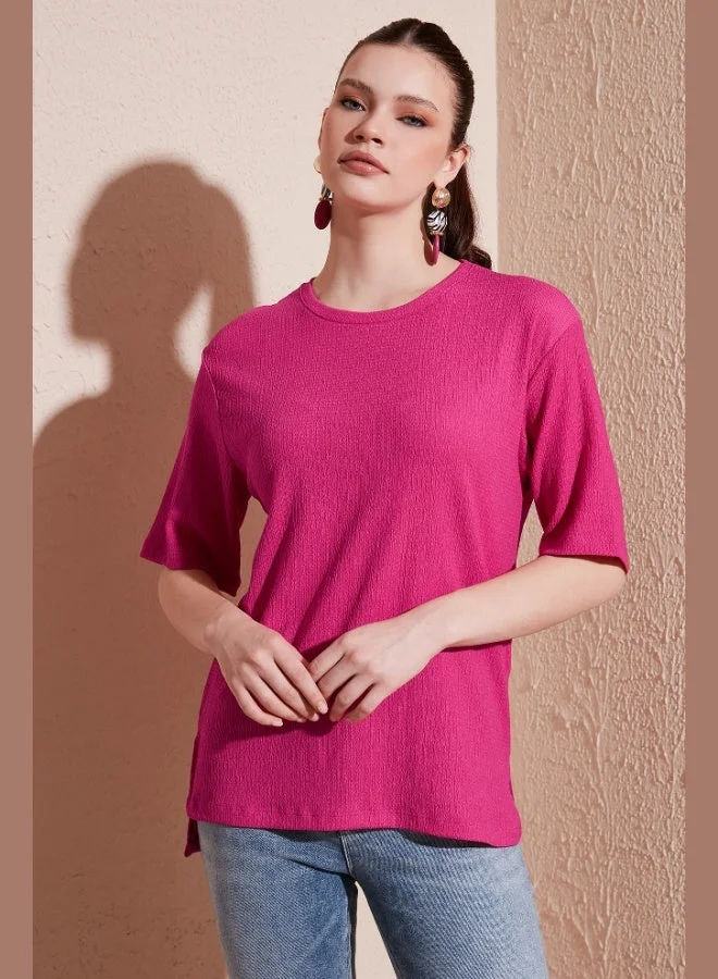 ليلا بلوزة نسائية ليلا بياقة دائرية وتفاصيل فتحات من قماش الكريب