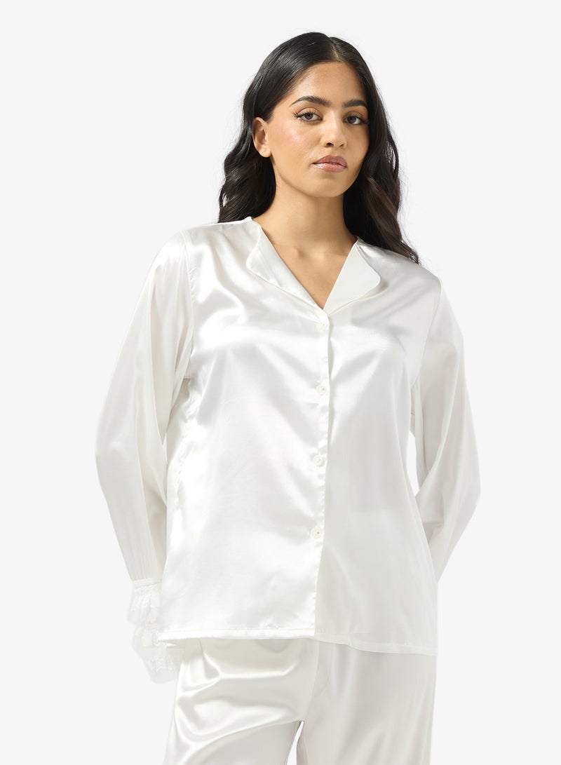 جينجر طقم بيجامة ساتان بأزرار وتفاصيل كشكشة - Image 3