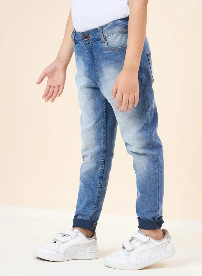 ستايلو بج بنطال جينز باهت بتفاصيل حمض مشطوف للبنات