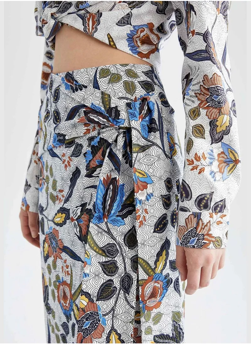 ديفاكتو A Cut Floral Print Midi Skirt