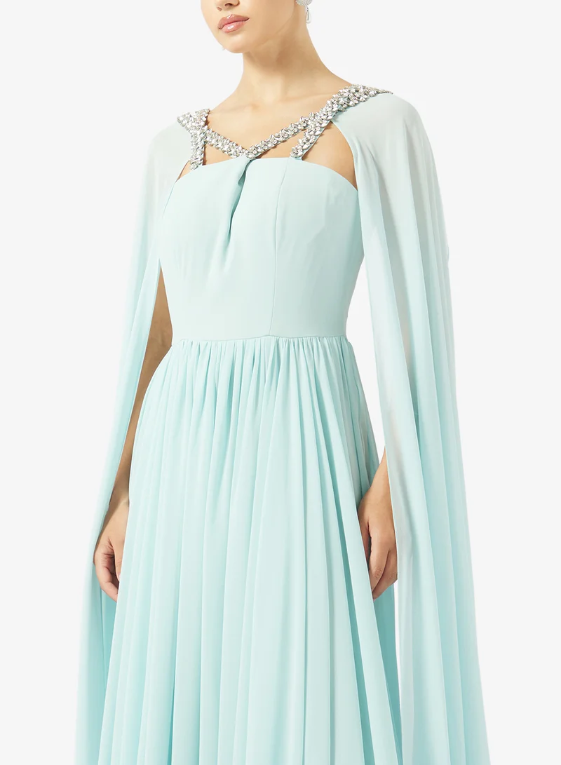 Akadia Fashion  CROSS CRYSTAL BUST DETAILS CREPE DRESS for Women | Best Price UAE