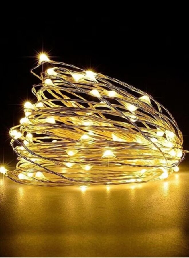 ماركة غير محددة سلسلة مصابيح LED بطول 10 أمتار لغرفة النوم، مصابيح LED خرافية مقاومة للماء 100 صفراء، مصابيح سلسلة للاستخدام الداخلي والخارجي، مصابيح سلسلة خرافية 8 أوضاع، سلسلة مصابيح LED مثالية لإضاءة الأحداث والدي  - Image 1