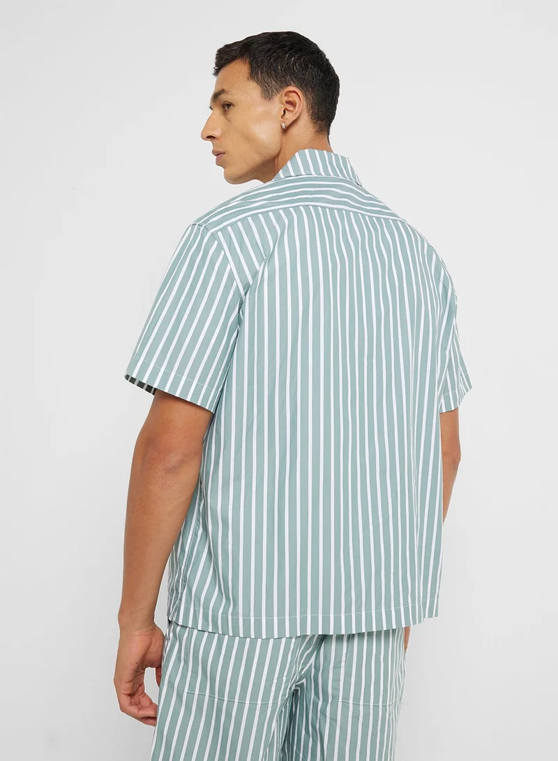 لاكوست قميص بأزرار بقصة عادية