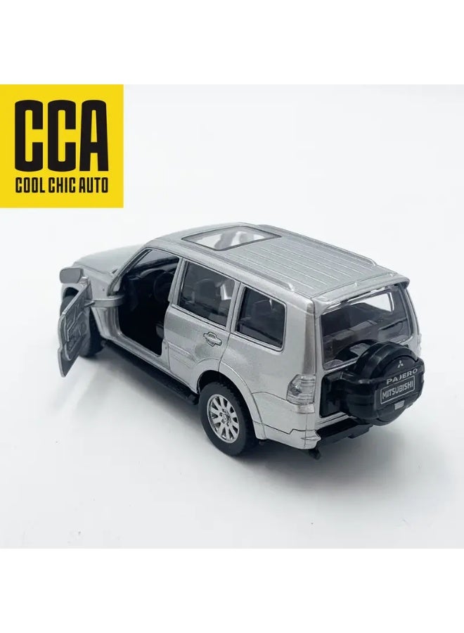 سي سي أيه سياره لعبة نموذج نوع ميتسوبيشي باجرو مقاس 1:43 لون رمادي فضي و ابواب قابله للفتح محاكاة الحقيقة سيارة جميلة المظهر مفيده للعب او زينة الغرفة او المكتب او وضعها ديكور على رفوف المجلس او يستخدمها محترفين التصوير للأعلانات او الخلفيات او اضافتها داخل تحفة مجسم عمل فني او تهديه لمن تحب للاباء او الابناء او هديه لشخص يقود نفس السياره - Image 4