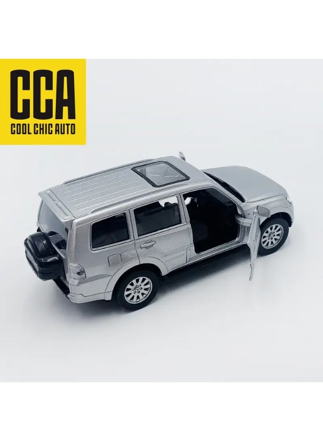 سي سي أيه سياره لعبة نموذج نوع ميتسوبيشي باجرو مقاس 1:43 لون رمادي فضي و ابواب قابله للفتح محاكاة الحقيقة سيارة جميلة المظهر مفيده للعب او زينة الغرفة او المكتب او وضعها ديكور على رفوف المجلس او يستخدمها محترفين التصوير للأعلانات او الخلفيات او اضافتها داخل تحفة مجسم عمل فني او تهديه لمن تحب للاباء او الابناء او هديه لشخص يقود نفس السياره - Image 2