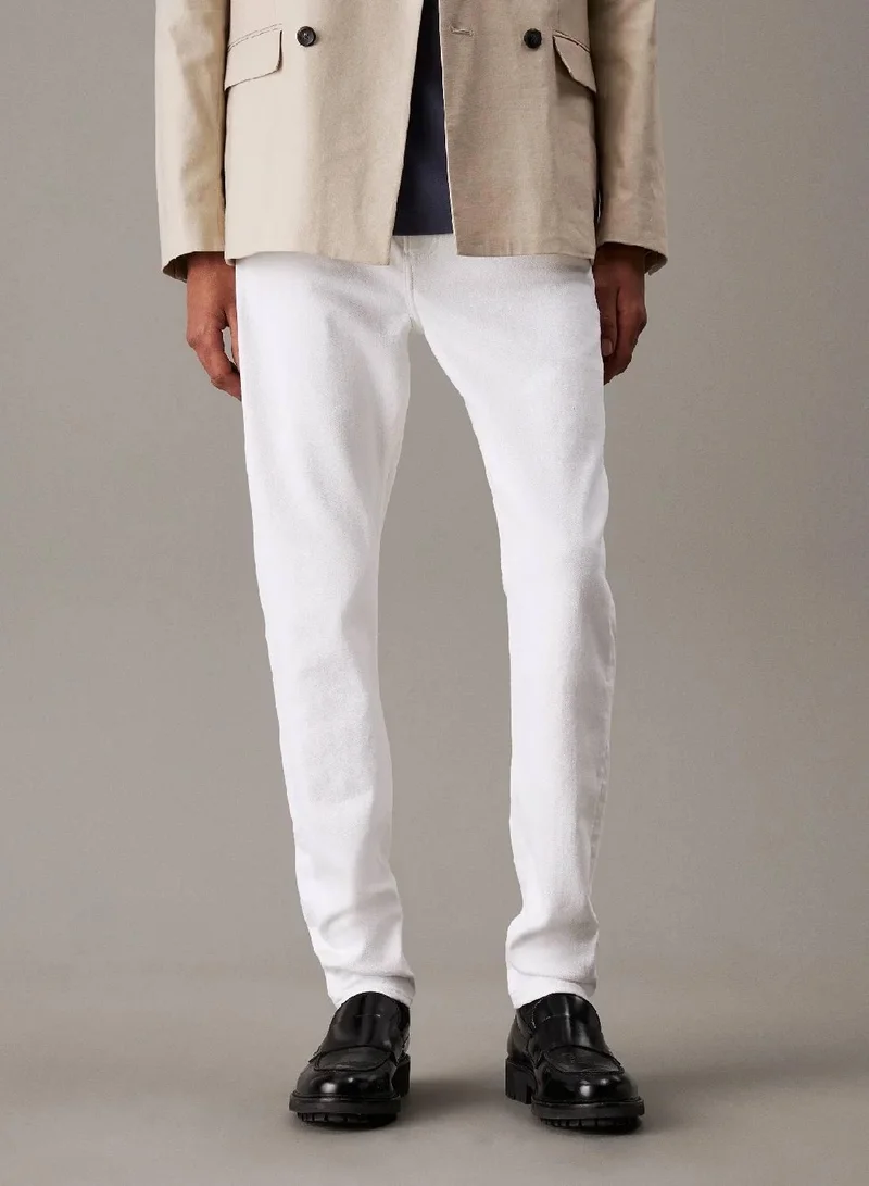 كالفن كلاين جينز بنطال دنيم بقصة سليم واسعة من الأعلى وضيقة عند الكاحل