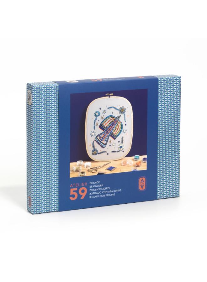 Djeco Atelier 59 Beadwork Art Kit, DIY Embroidery Set with Wooden Hoop, Printed Canvas, Beads and Sequins, Needles, Thread, Scissors, Creative Craft Kit for Home Decorative Art Projects - Image 1