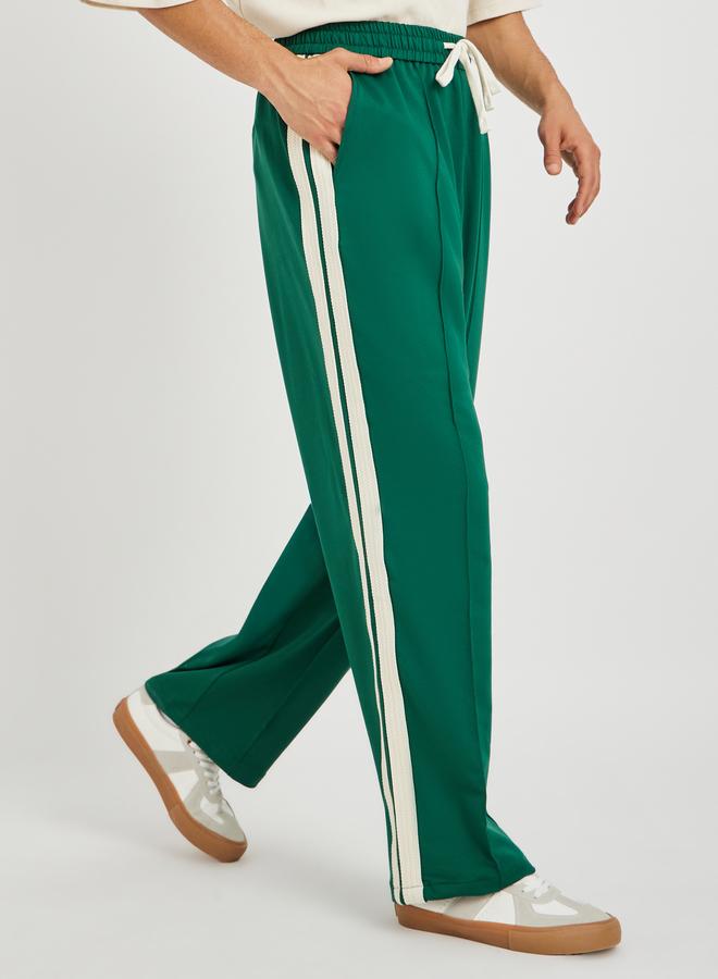 ستايلي جوجر واسع بفتحة سفلية وشريط جانبي - Image 1