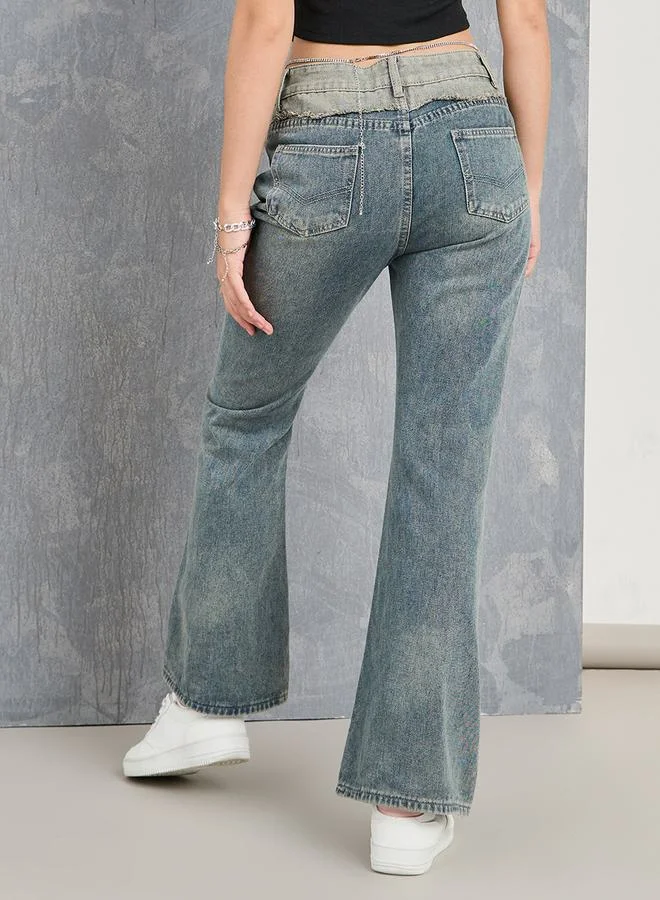 تايك تو جينز واسع بقطع وخياطة