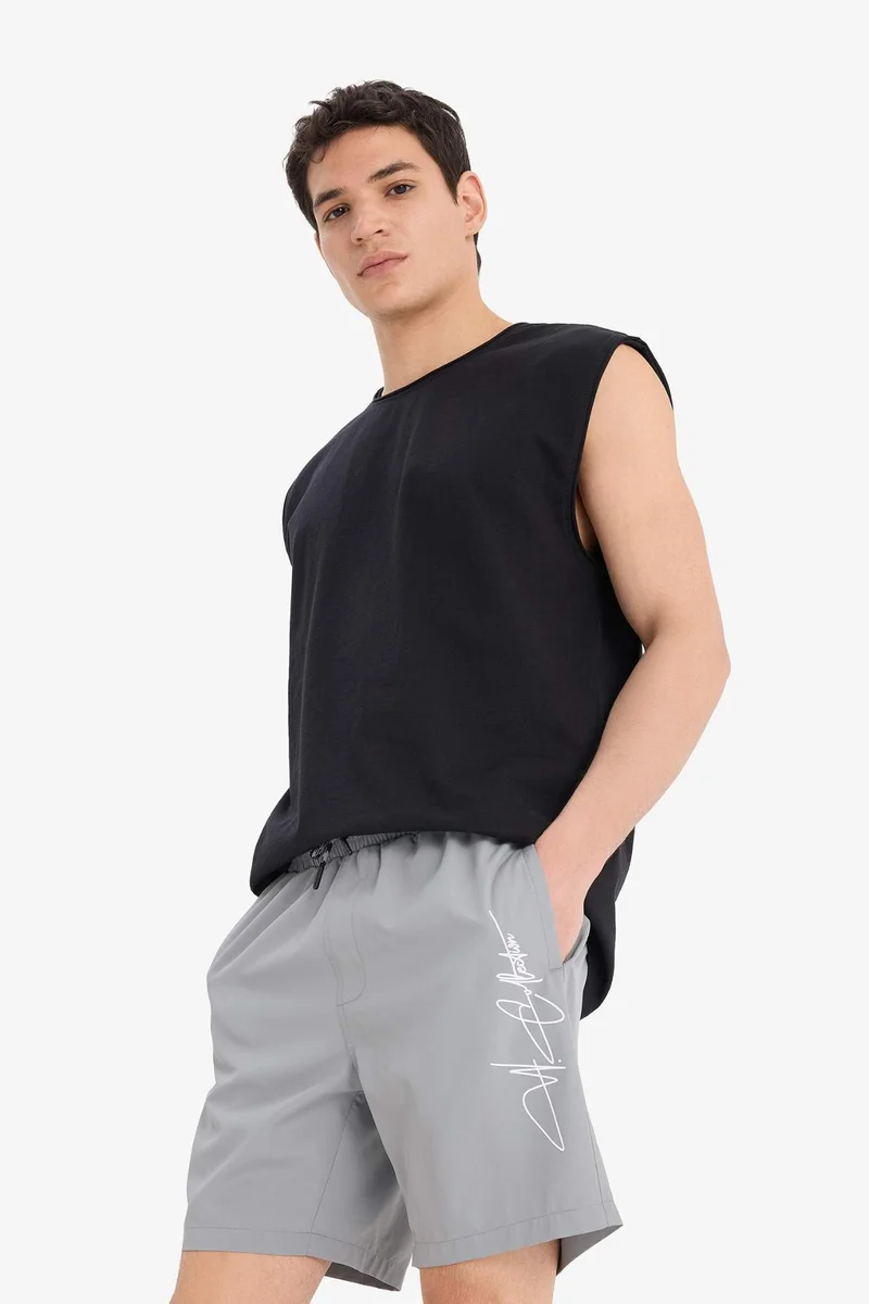 Defacto  Regular Fit Mesh Lined Short Length Swim Shorts for Men | Best Price UAE