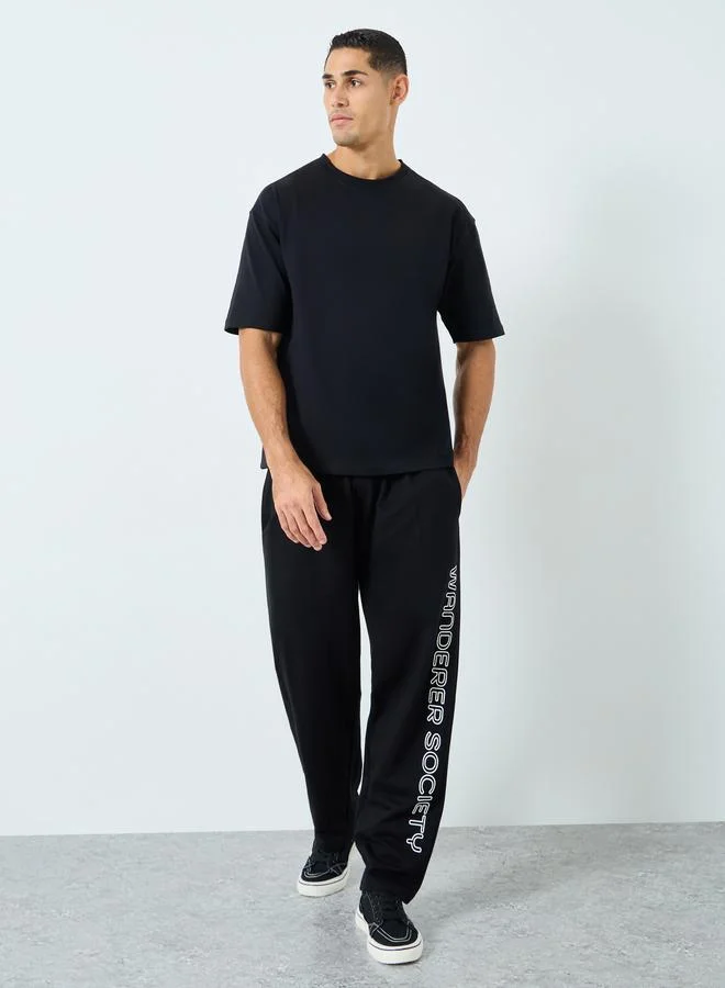 Styli Styli Men Black Oversized Slogan Print T-Shirt