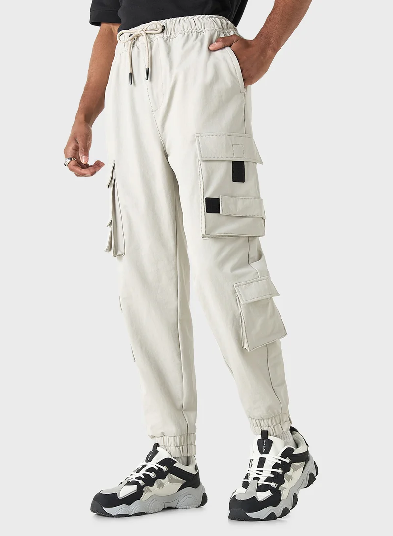 اس بي كاركترز Solid Relaxed Fit Cargo Pants with Drawstring Clos